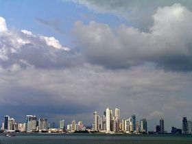 Panama City, Panama, skyline with clouds as viewed from the ocean – Best Places In The World To Retire – International Living